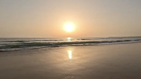 Handheld video of beautiful sunset over gentle ocean Stock Footage 332065129