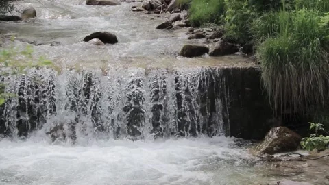 Handheld video of a mountain river Stock Footage 209558805