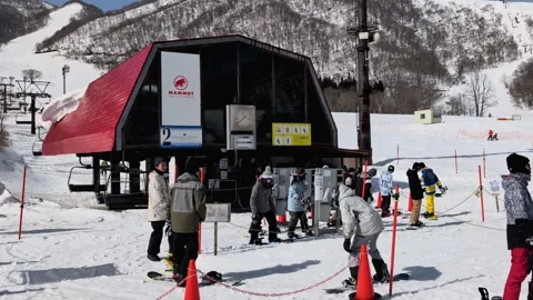 Handheld Video of People Queuing for Ski Lift in Winter Stock Footage 329767240