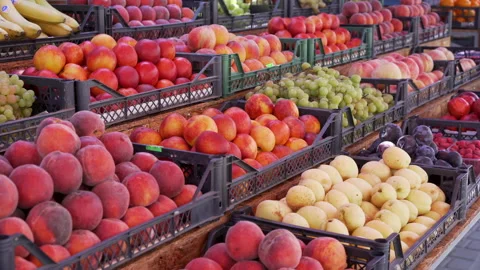 Handheld Videos Effect Fruit bazaar peaches nectarine grapes apricots Stock-Footage 137005911