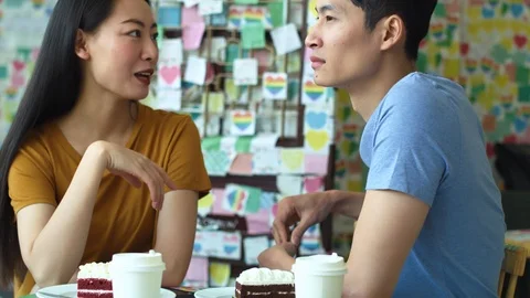 Handheld view of happy couple at cafe Stock-Footage 125087231