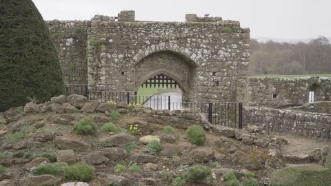 Handheld view of old walls of Leeds castle in Maidstone England Stock Footage 126548376