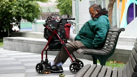Handicap man on park bench Stock Footage 788533