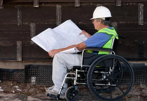 Handicapped contractor Stockfoto's