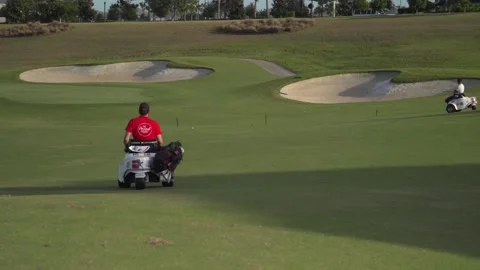 Handicapped golfer rolling on a golf course Stock Footage 158744691