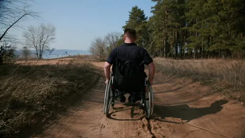 Handicapped male from behind Stock Footage 152770876
