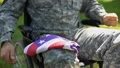 Handicapped peacekeeper holding american flag, country pride, sacrificed hero 4k or 4k+ Resolution