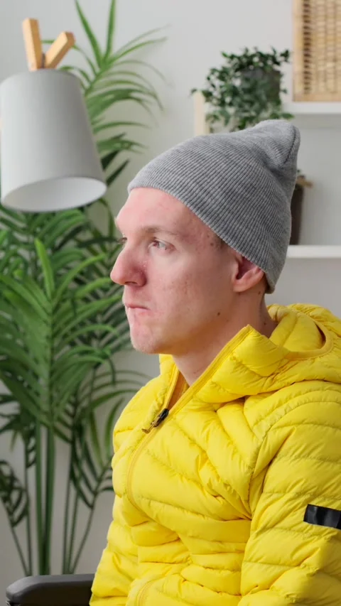 Handicapped pensive man looking through window Video stock 262184149