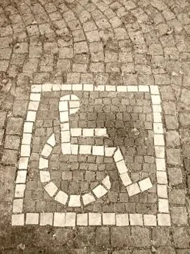 Handicapped sign on plaster Foto stock