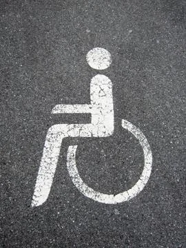 Handicapped sign on plaster Foto stock