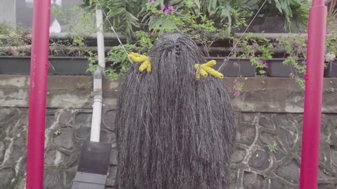 Handicrafts in the form of native Indonesian ghosts called genderuwo Stock Footage 221800480