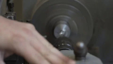 Handicraftsman working with a lathe Stock Footage