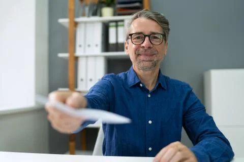 Handing Employee Payroll Cheque. Security Check Stock Photos