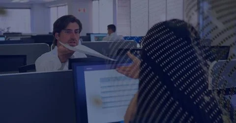 Handing man extending sheet across open office, hijab colleague reaching near Stock Photos