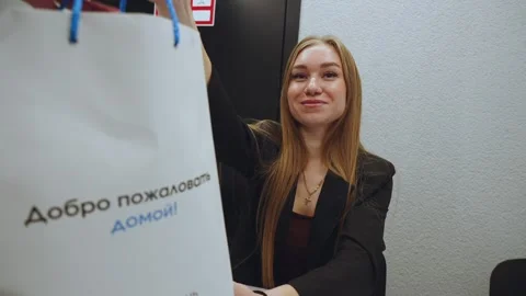 Handing over documents to a new resident, buying an apartment Stock Footage 313786016