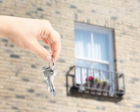 Handing over key Stock Photos
