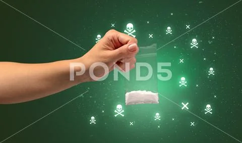 Handing over pills with skulls Stock Photos