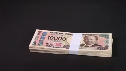 Handing over the stack of bills (placing the stack of bills) Stock Footage 307076245