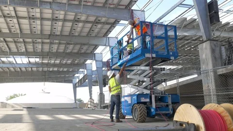 Handing Off Wire Stock Footage 123947766