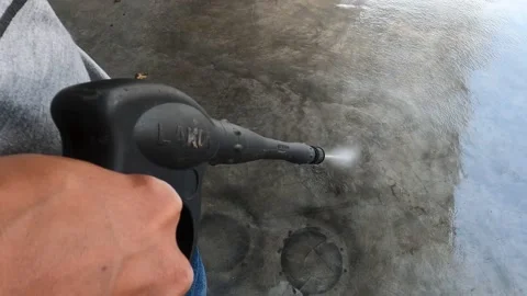 Handle And Spraying Floor Surface Using Water Sprayer Canon Pump Portable Stock Footage 160447367