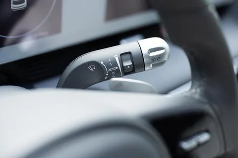 Handle with buttons windshield wiper and washer in car. Detail of controller in Photos