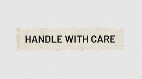 Handle With Care Aged Masking Tape Peeling, Transparent Alpha Channel Video Stock Footage 346032593
