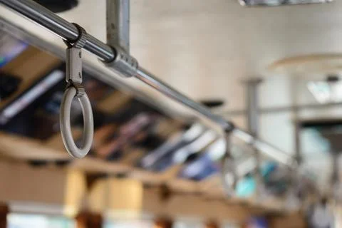 Handle on ceiling of bus. Photos