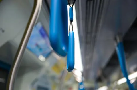 Handle on ceiling of bus, a train, MRT, prevent toppling.underground railway  Stock Photos