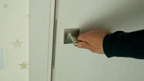 Handle the door to the room. Selective focus. Stock Footage 223734407