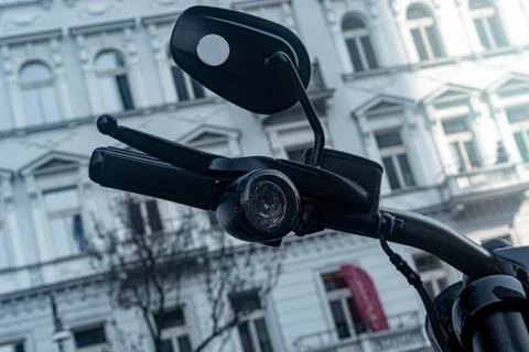 Handle on the handlebars of a motorcycle close-up Stock Photos