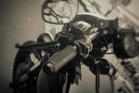 Handle on the handlebars of a motorcycle close-up Stock Photos