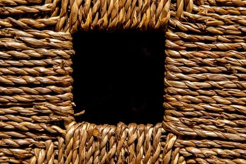Handle hole on a wicker bin Photos