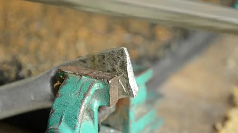 To handle the metal with a file,hand. Stock Footage 140636994
