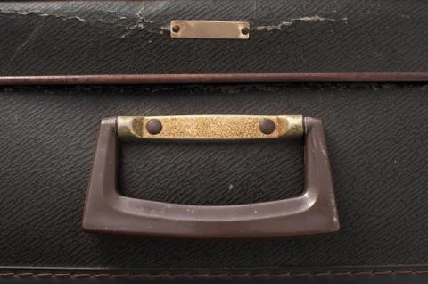 Handle on an old suitcase Stock Photos