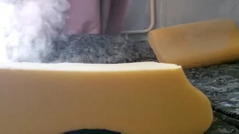 Handle the steam with the help of a pair of bedding pillows. Desinsection of the Stock Footage 153151750