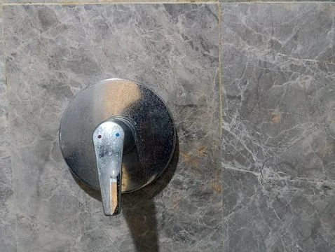 Handle on tile wall Stock Photos