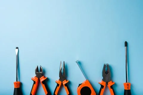 Handled tools or construction tools on blue background Stock Photos