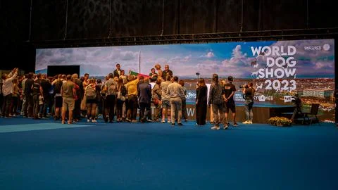 Handler presenting dog during World dog show. Geneva, Switzerland. Stock Photos