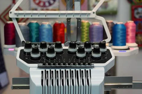 Handles of management of the sewing machine Stock Photos