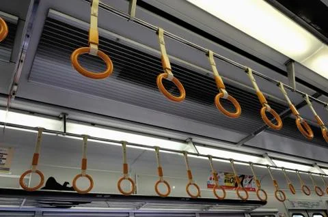 Handles at the subway Stock Photos