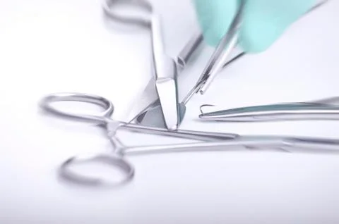 Handling surgical instruments Stock Photos