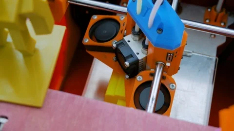Handmade 3D printer machine printing plastic model - close up top view Stock Footage 126835869