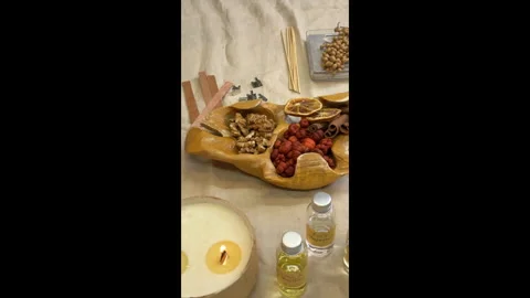 Handmade Aromatherapy Candle Making Process Flat Lay with Dried Flowers and Cera Stock Footage 311148281