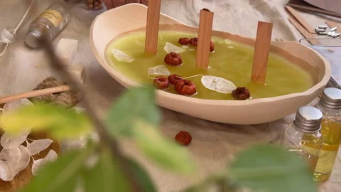 Handmade Aromatherapy Candle Making Process Flat Lay with Dried Flowers and Cera Stock Footage 311151192