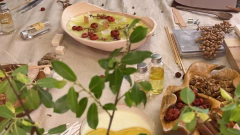 Handmade Aromatherapy Candle Making Process Flat Lay with Dried Flowers and Cera Stock Footage 311172260