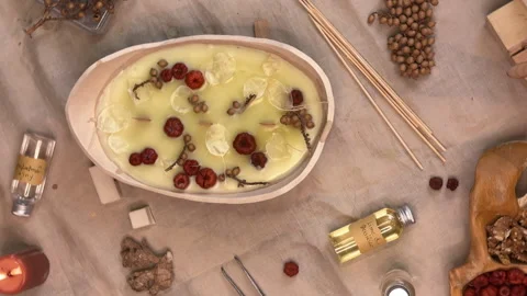 Handmade Aromatherapy Candle Making Process Flat Lay with Dried Flowers and Cera Stock Footage 311172523