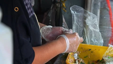 Handmade authentic Xian Bing meat pie, a stall vendor filling a dough Stock Footage 274283487