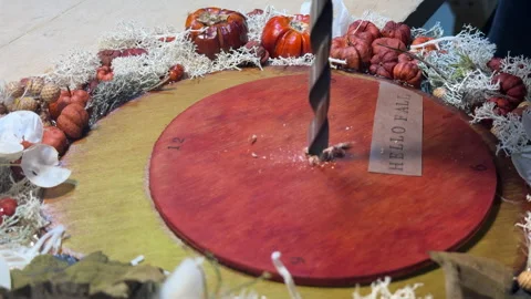 Handmade autumn clock decorated with dried flowers and pumpkins. Cozy fall craft Stock Footage 317583702