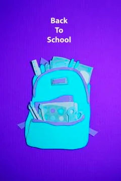 The handmade backpack with school accessories was cut out of blue, purple paper 스톡 일러스트