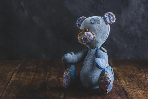 Handmade Bear Sitting on Table Stock Photos